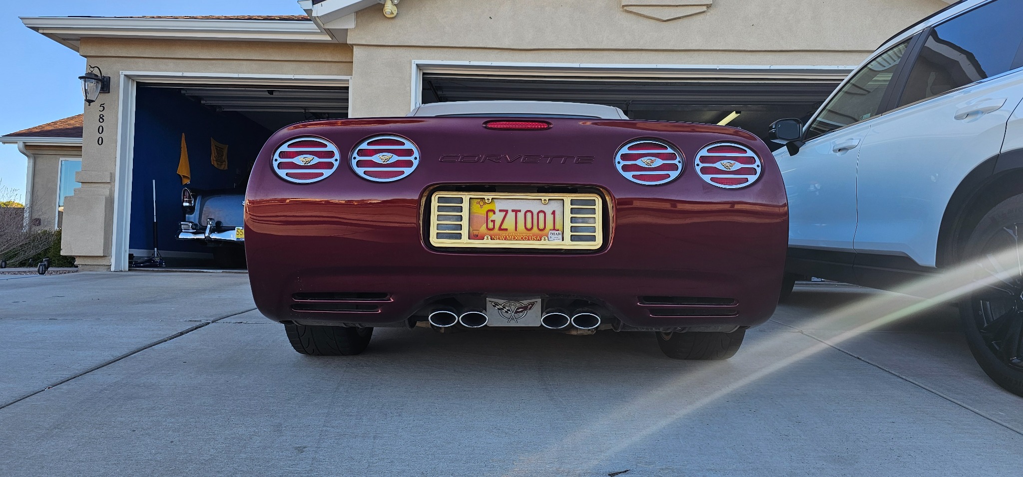 Rear view of the anniversary Corvette showing its four round taillights