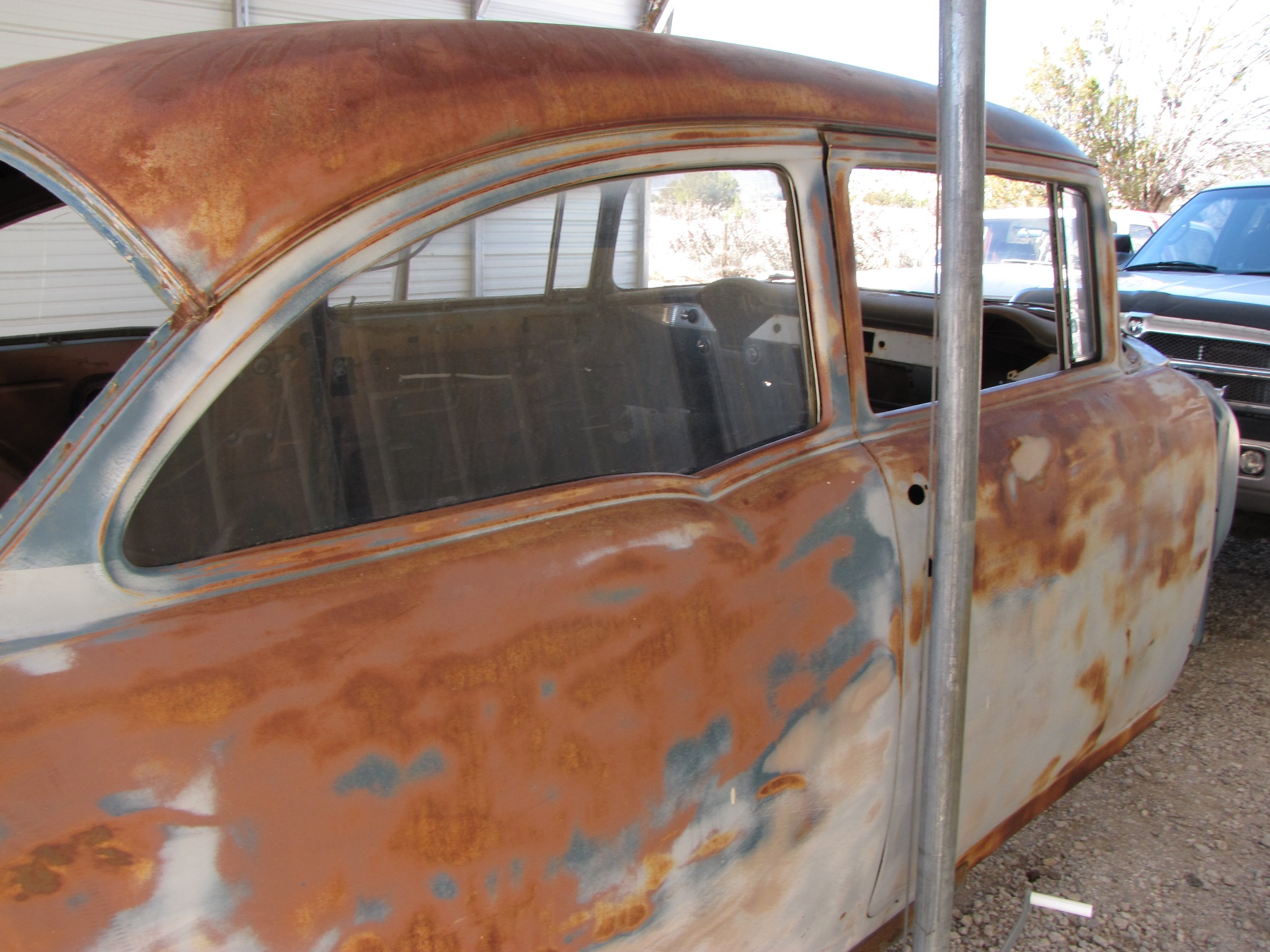 Close view of Midnight Storm's bodywork during restoration