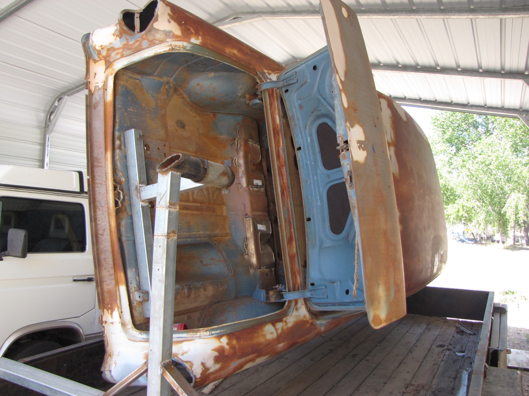 Midnight Storm's body mounted on a rotisserie during restoration